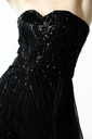 Ruffled jumpsuit adorned with a corset